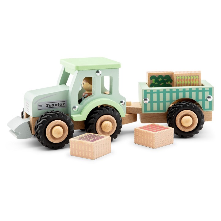 Wooden tractor with trailer and vegetables